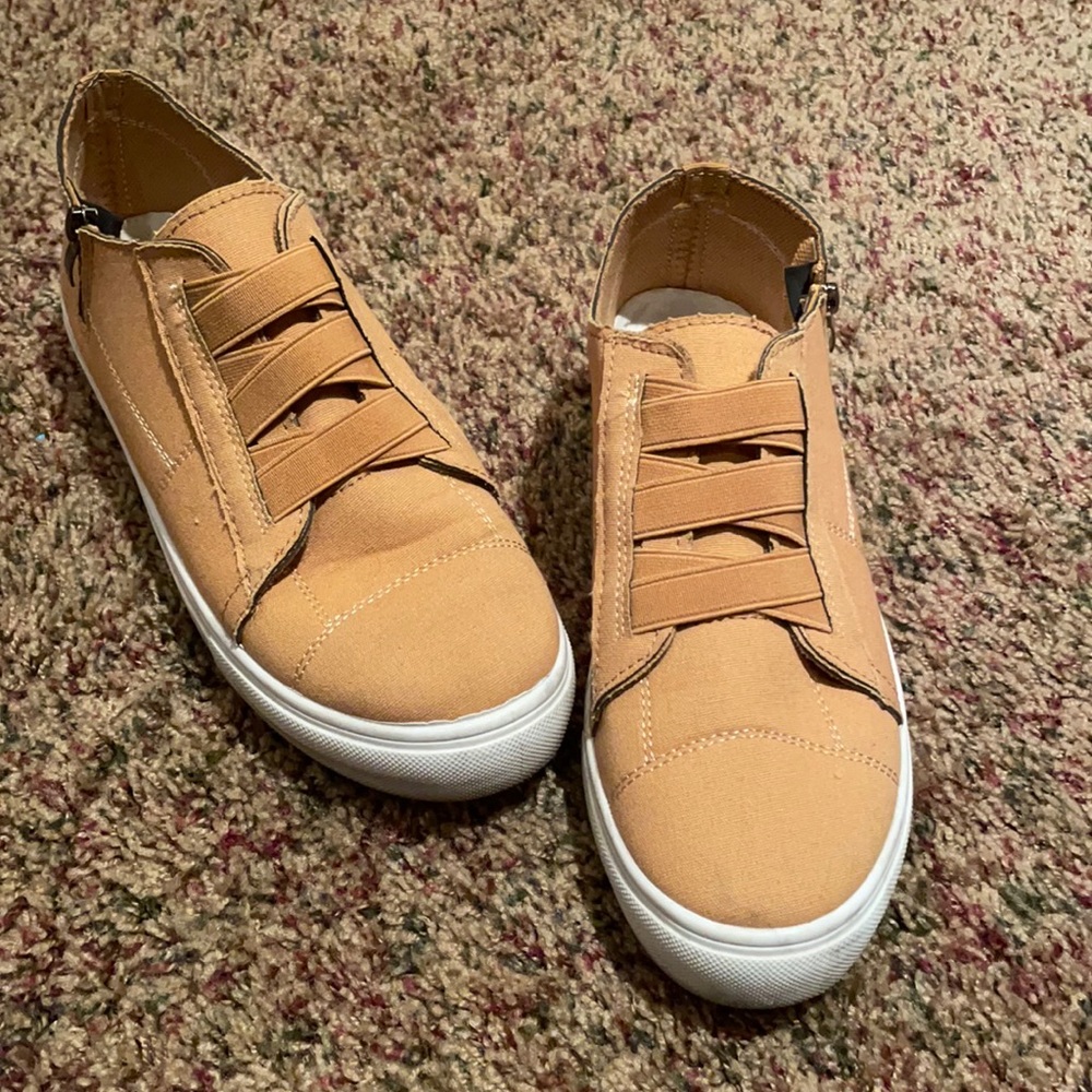 Gold slip on sneakers